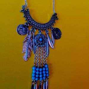 Nadine West long feather statement necklace